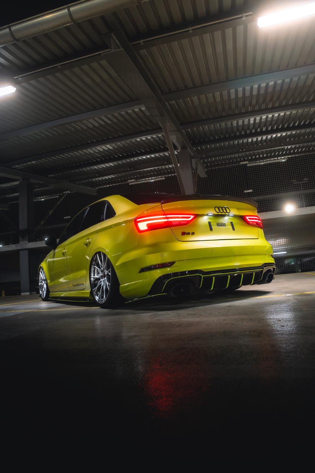 car mechanic workshop at night, dramatic lighting, automotive repair shop